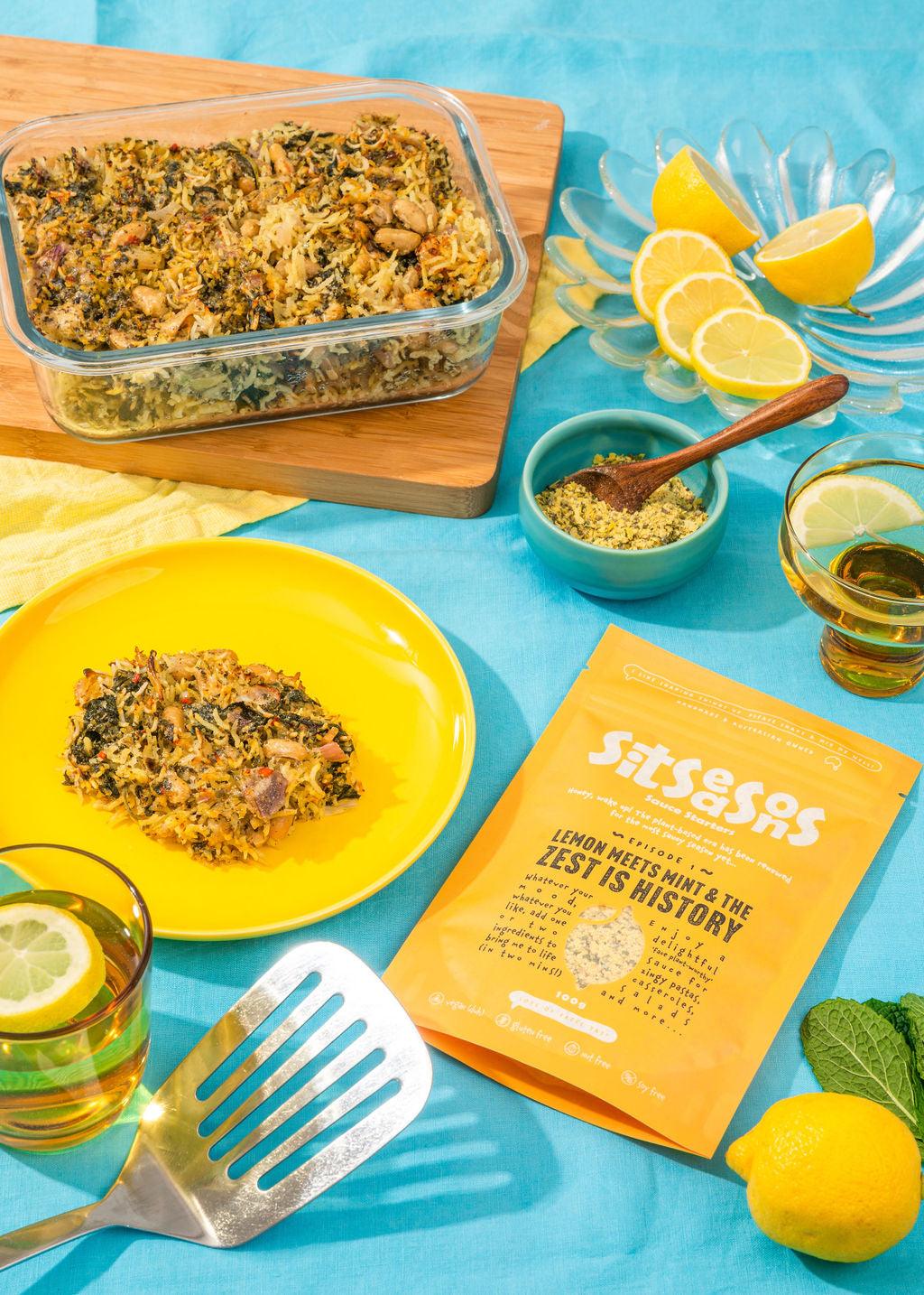 A baking dish and plate with a vegan spinach and artichoke lemon casserole