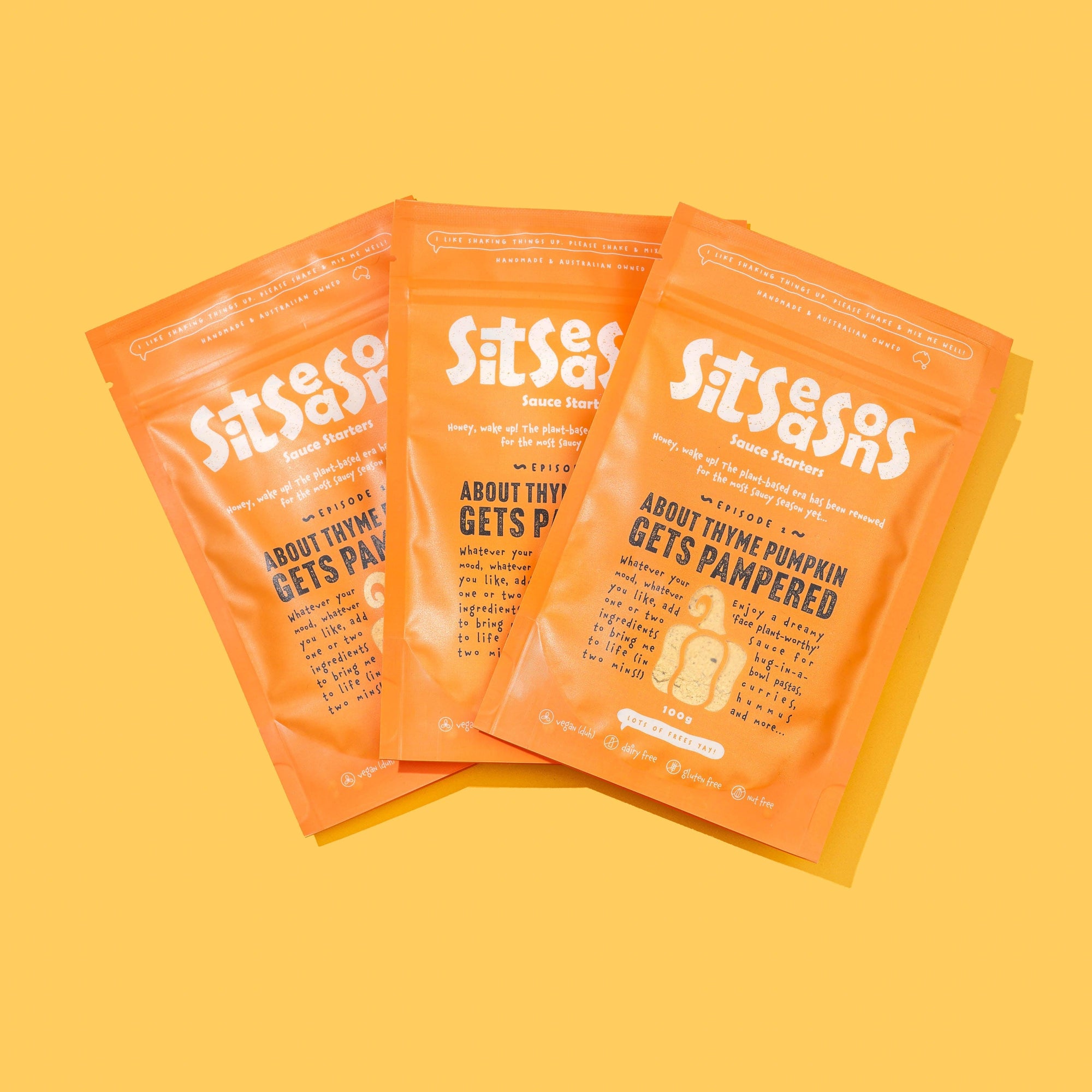 Three 100g orange packets of vegan pumpkin sauce
