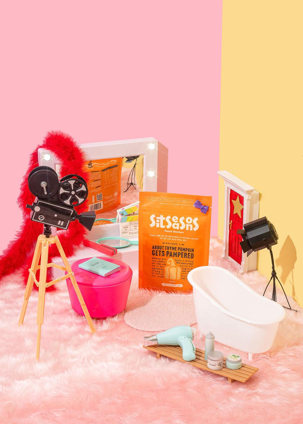 Orange pumpkin seasoning packet sitting backstage in a dressing room